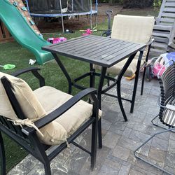 Small high table and 2 chairs