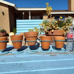 Terracotta's with metal holders