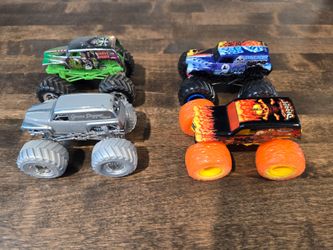 4 Monster Jam Trucks