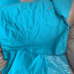 2 Pairs Of Scrubs