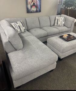Pottery barn gray chenille sectional couch and ottoman