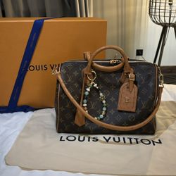 Louis Vuitton 30” Speedy Ostrich Leather Bag