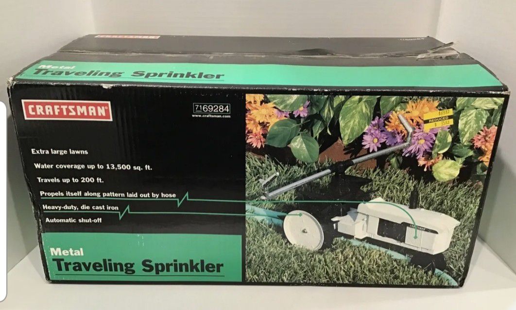 New In Box. Craftsman Traveling Sprinkler. Metal. For Large Yards.