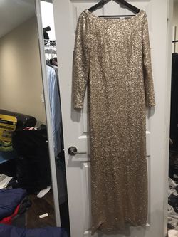 Gorgeous gold sequin dress. The most comfortable gown I’ve tried. Worn once for a Baptism party.