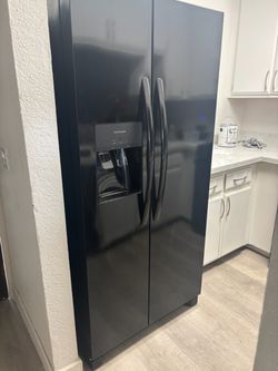 Frigidaire black refrigerator. Needs to go today