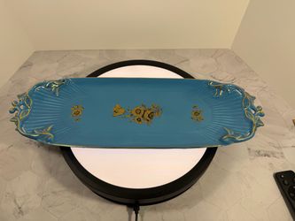(1) Vintage vibrant turquoise ceramic serving tray featuring an elongated shape with gold floral decals and scalloped, fluted ends.
