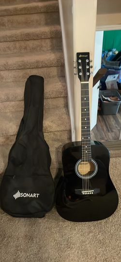 Sonart acoustic guitar with bag