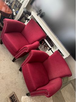 TWO RED ARM CHAIRS