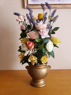Artificial home made flower arrangement