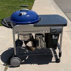 Weber Blue Performer Deluxe Charcoal Grill with cover and charcoal