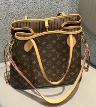 Louis Vuitton embossed shopping bag