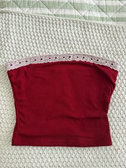 Red cropped tube top with white lace trim detailing