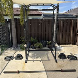 Selling weights (300lbs total includes olympic bar)