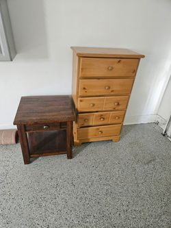 Free items....dresser, chair, end table, 2 area rugs
