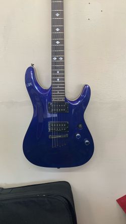 Blue Schecter guitar