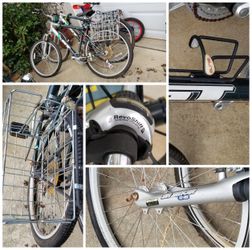Two adult mountain bikes GT built in grocery baskets for Green Shopping