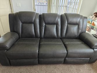 POWER RECLINER SOFA WITH ADJ HEADREST