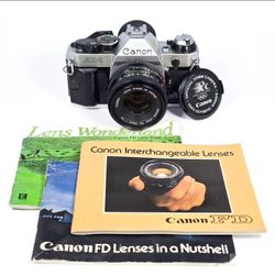 Near MINT Canon AE-1 Program 35mm SLR Film Camera w/ Canon 50mm Lens & Manuals