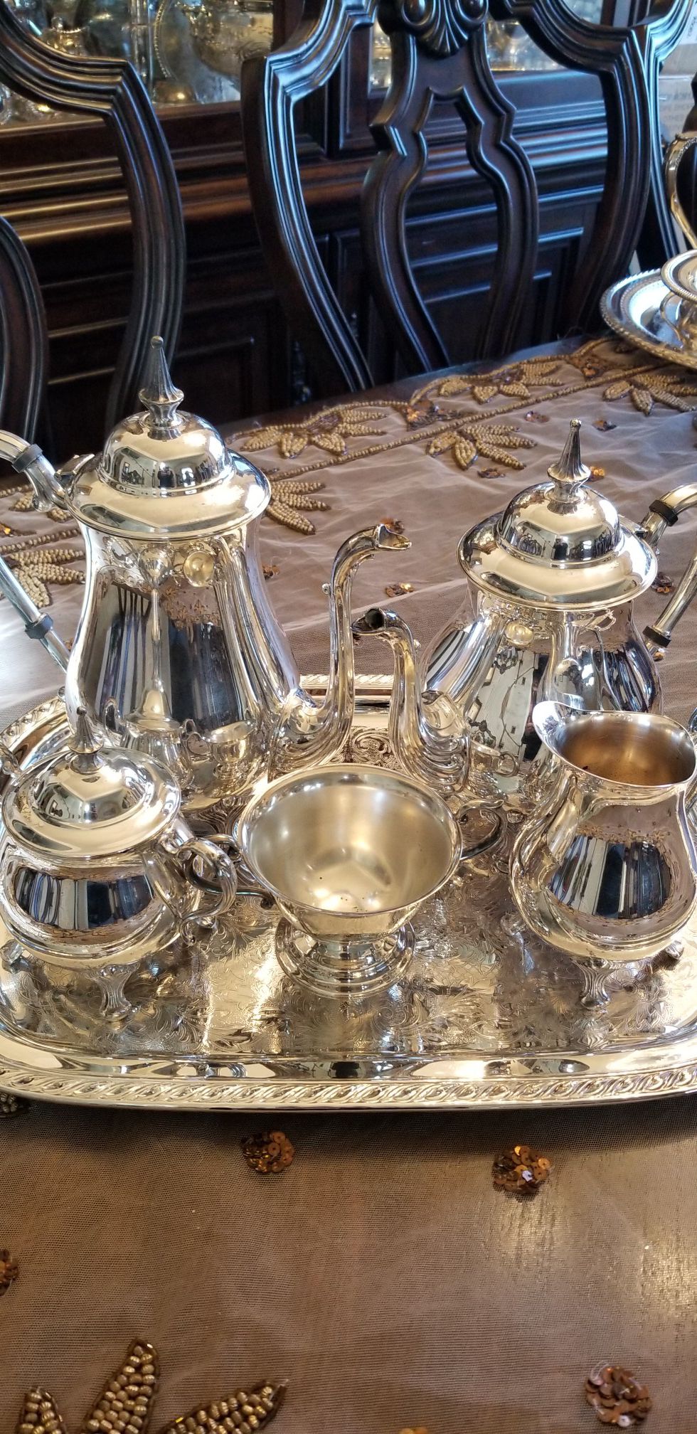 Silverplated tea and coffee set with edge decorated tray