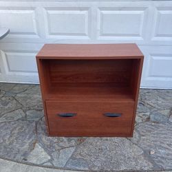 Bookcase with storage drawer