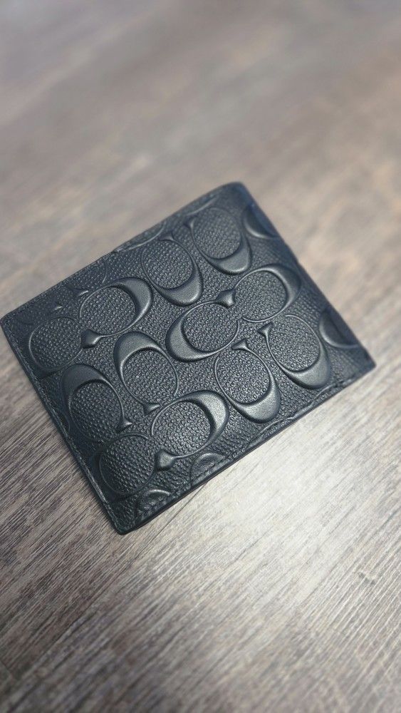 Coach bifold wallet Black Leather. Brand new with tags.