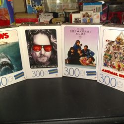 4 Brand New 300 Piece Blockbuster Puzzles..Jaws, The Big Lebowski, The Breakfast Club, And Animal House