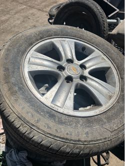 Set of 16 inch Chevy rims [4]