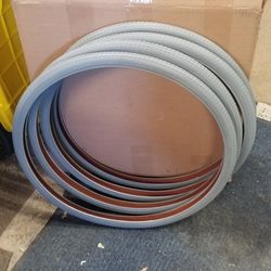 (4)BICYCLE TIRES / BRAND NEW 26 1 3/8" COLOR IS GRAY
