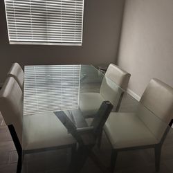 City Furniture, 6 chairs and glass table top. Perfect condition.