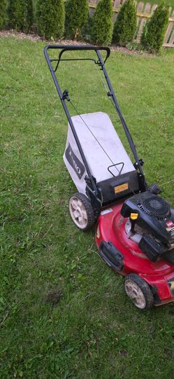 Toro Lawnmower 6.75, 4 Cycle ...gas, self Propelled side discharge, with bag