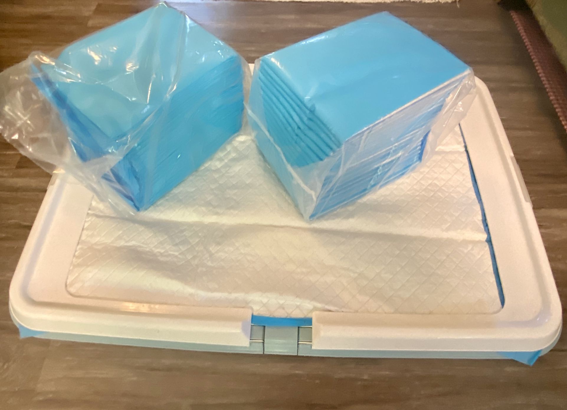 Never used indoor potty trainer for small pets With Potty pads Like New