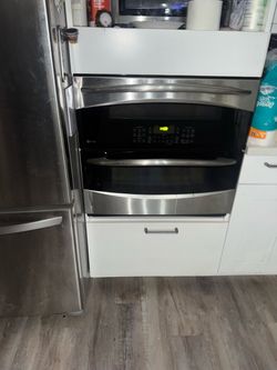 fridge , 2 door oven . and dish washer