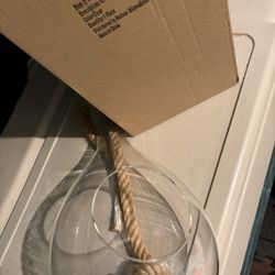 This is a 15" Clear Rope Hanging Terrarium