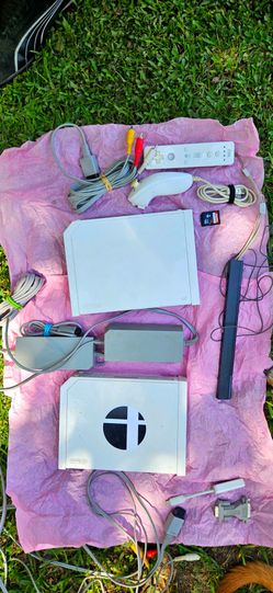 Two Wii consoles and hardware with 64GB Sandisk Memory card