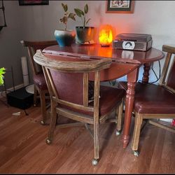 Vintage Rolling Chairs And Table