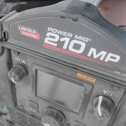 Power MIG 210 MP With The Cart In The Tank