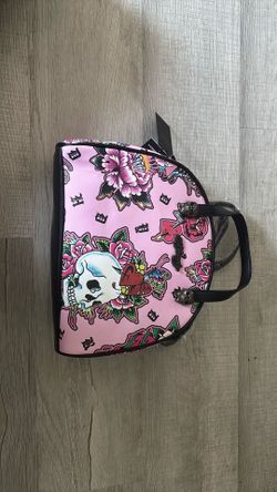 Pink ed Hardy wallet with flowers and skull design with black interior Pink and Hardy wallet with flowers and skull design with black interior