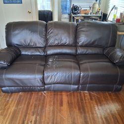 Leather couch with recliners