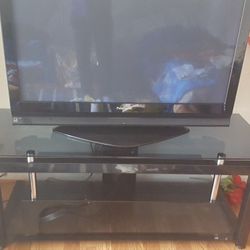 42' Panasonic HD tv with nice table for it