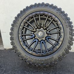 22" Fuel Rebel rims 22x10 w/ 35x12.50R22 Cooper Stt tires