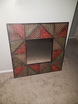 Mirror square embossed metal from Pier 1 imports. Excellent condition