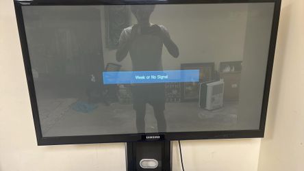 Samsung TV with Glass and Metal TV Stand