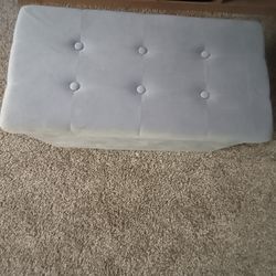 Gray soft ottoman with storage inside