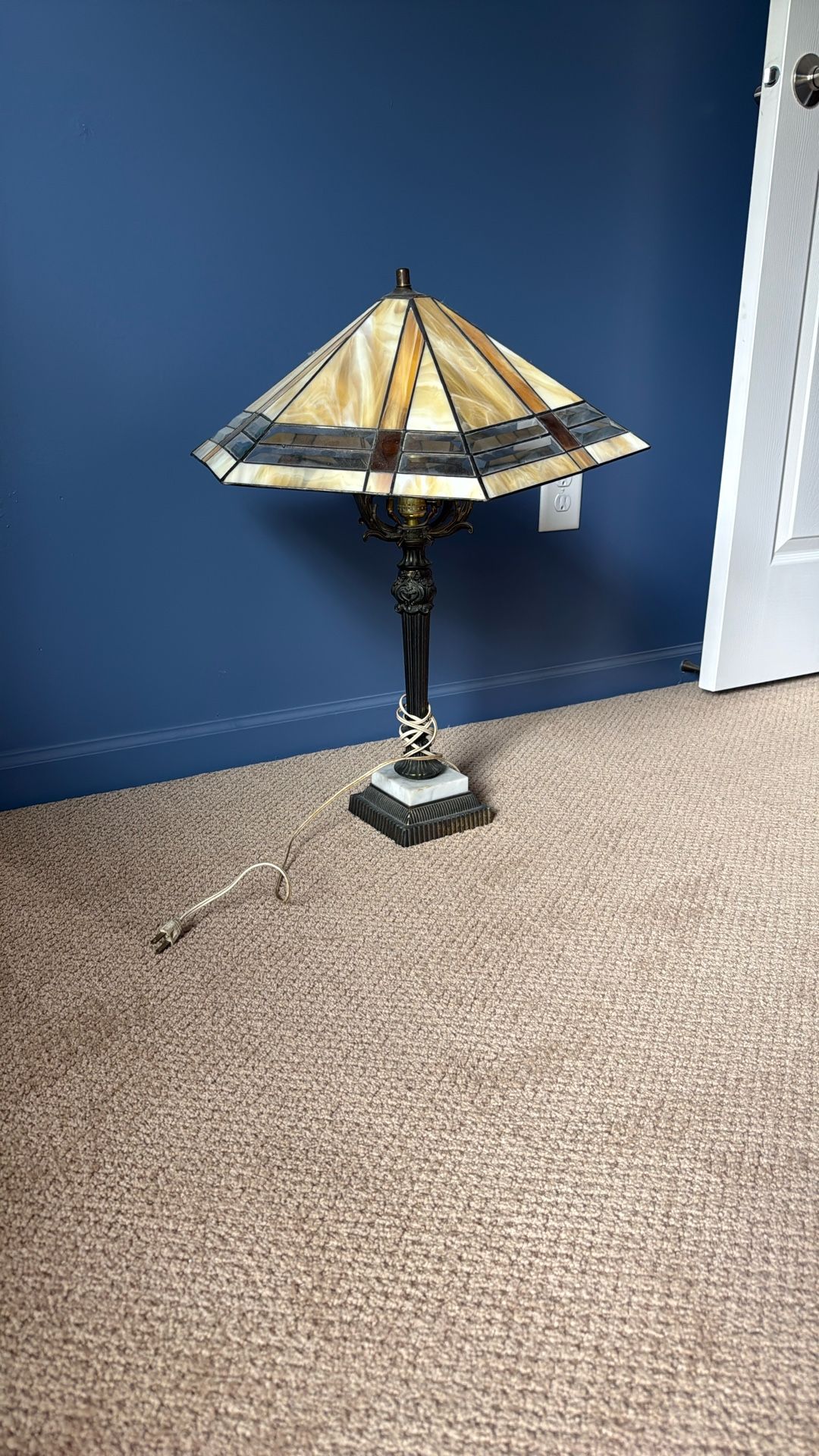Antique lamp with stained glass shade