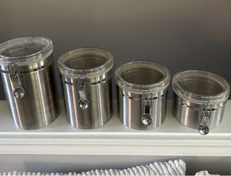 Set of 4 matching stainless steel canisters in great shape!