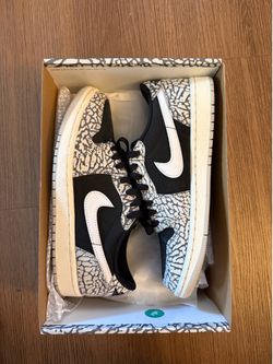 Jordan 1 low retro og black cement