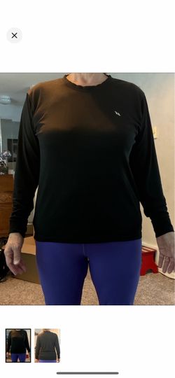 Size medium, black long sleeve women’s performance top