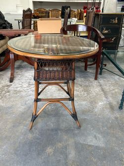 Wicker table with glass top