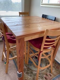 Solid wood high-top table with chairs