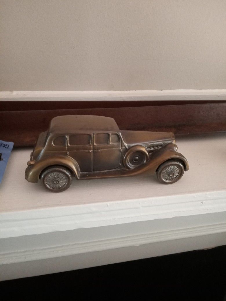 BRASS BANK. IN GOOD CONDITION. IT ROLLS GOOD